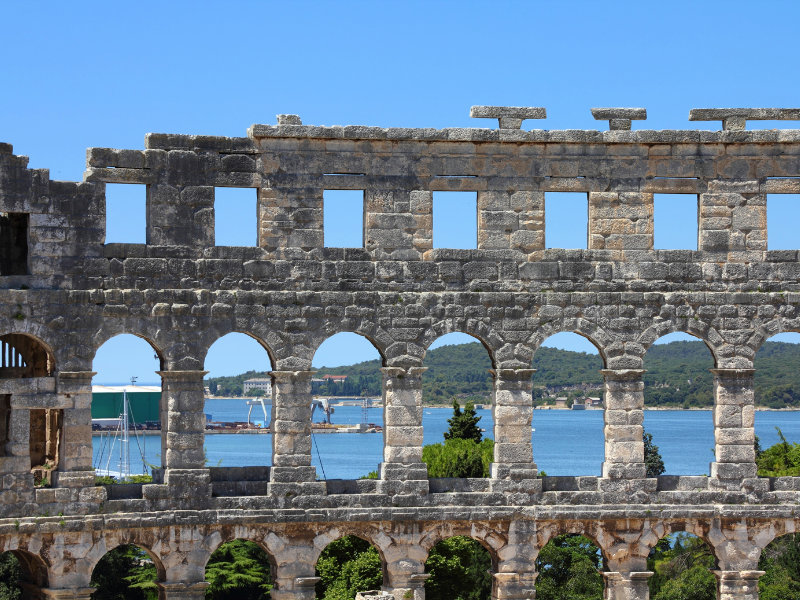 A seaview from inside of a Roman amphitheater