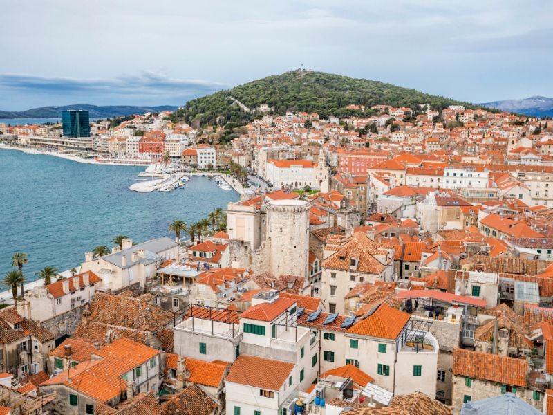 Aerial shot of Split city in Croatia overlooking Marjan hill