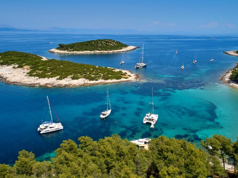 Aerial view of island of Lastovo, overlooking a few yachts anchored