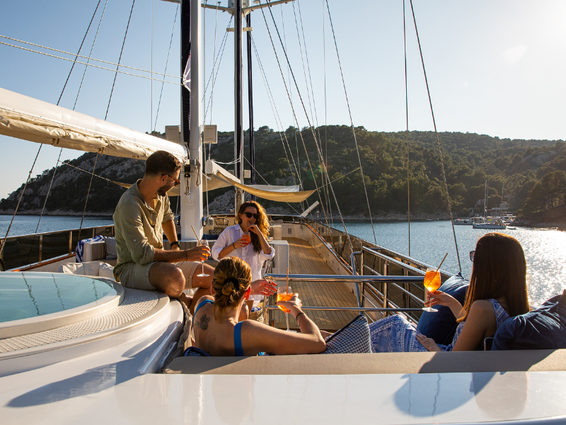 Family enjoying some downtime onboard yacht Clase Azul